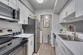 Stainless steel appliances with glass top stove
